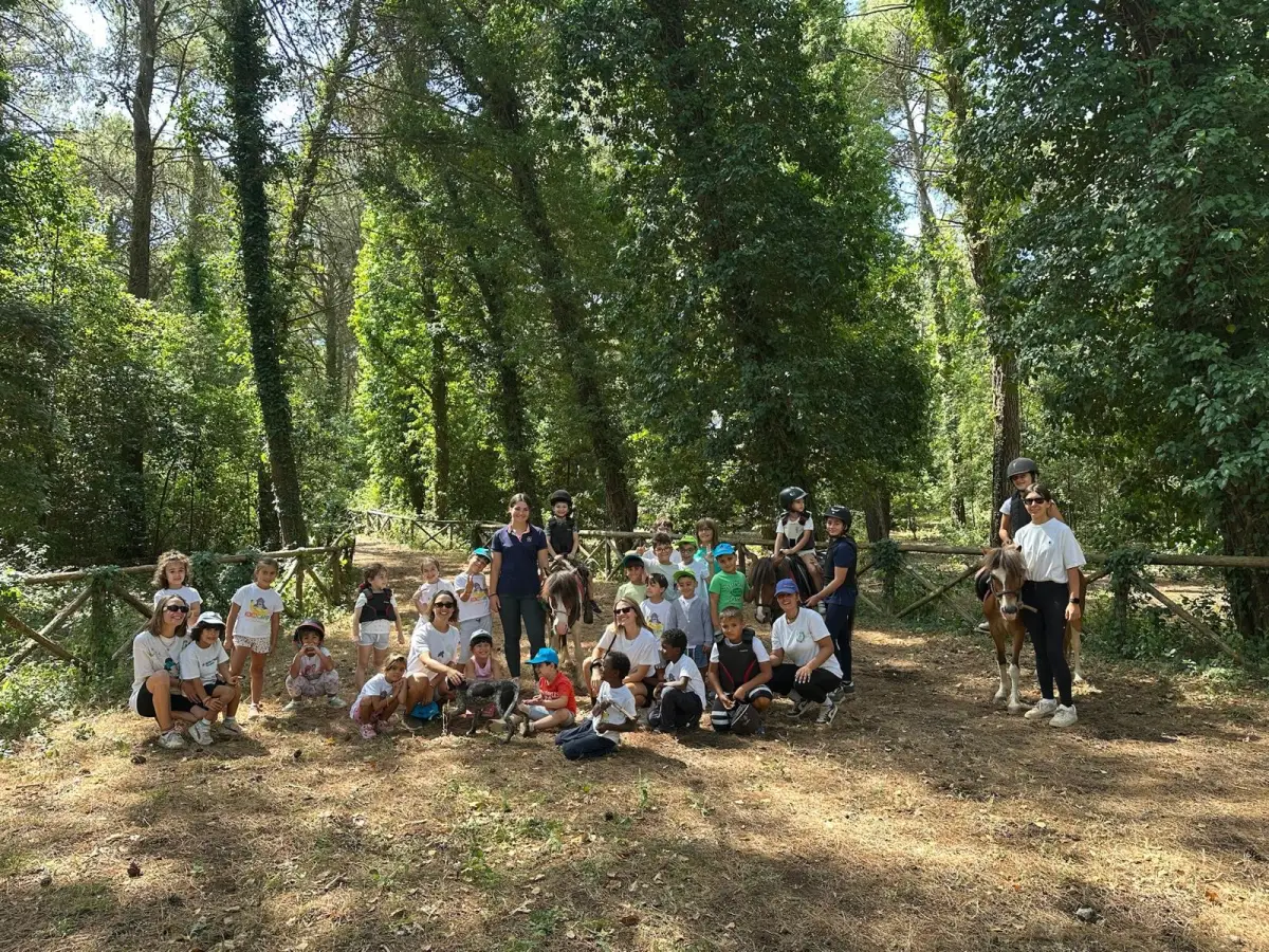 The KokoCamp group in the woods at Casale dei Pini
