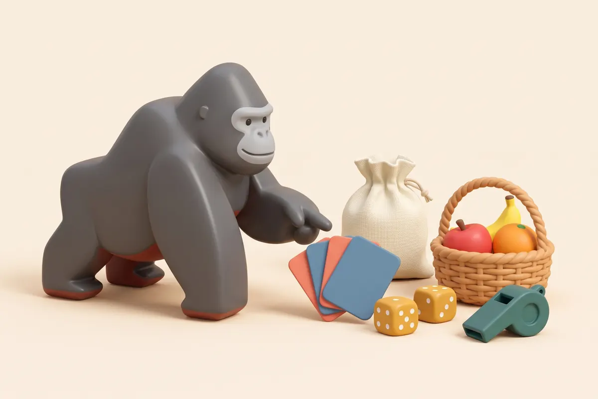 Oggetti per giocare in inglese a casa: sacchetto di stoffa, carte, dadi, cestino di frutta e KOKO il gorilla