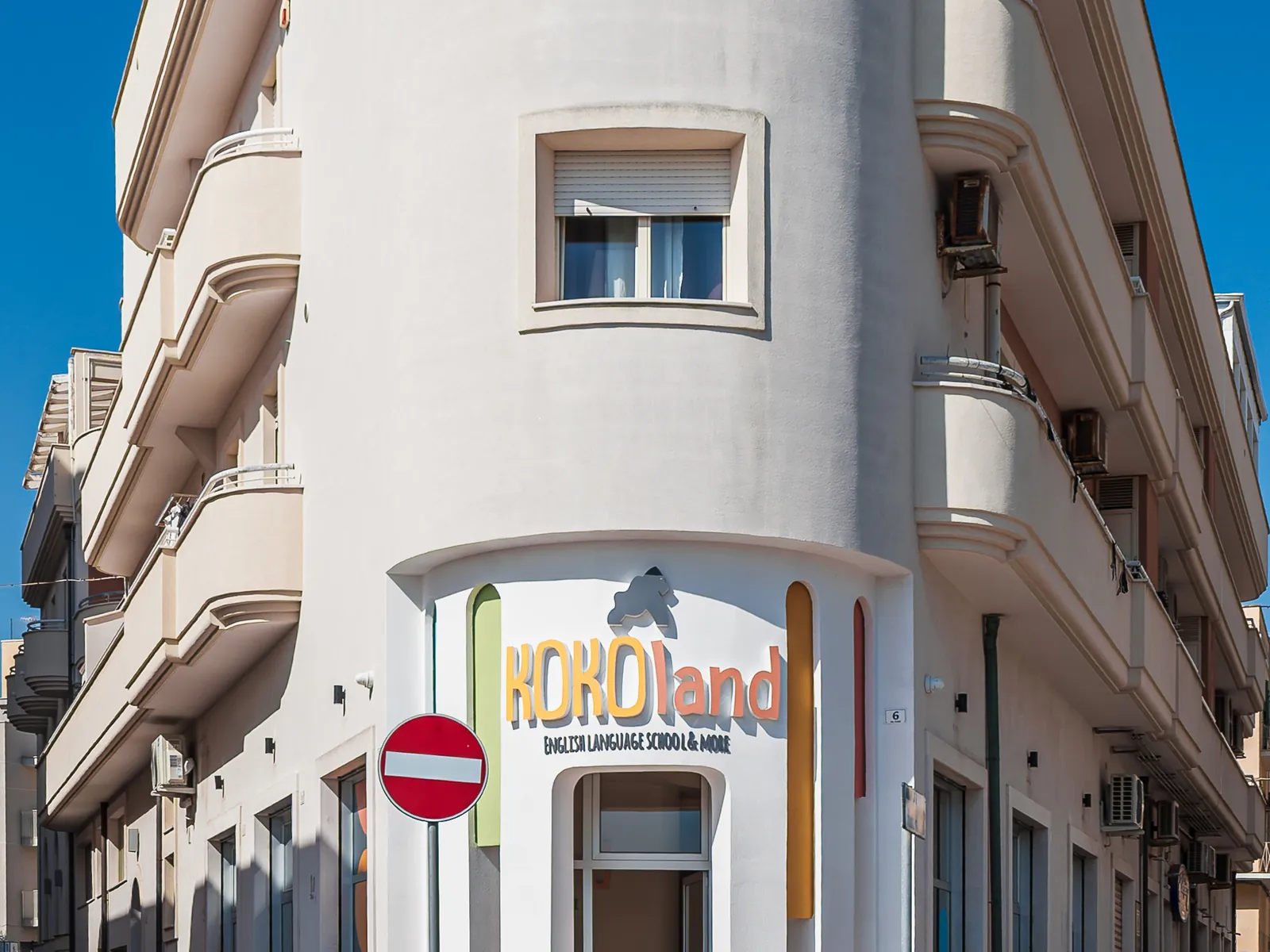 The KOKOland sign above the entrance of our school at Via Fiume 6, Monopoli